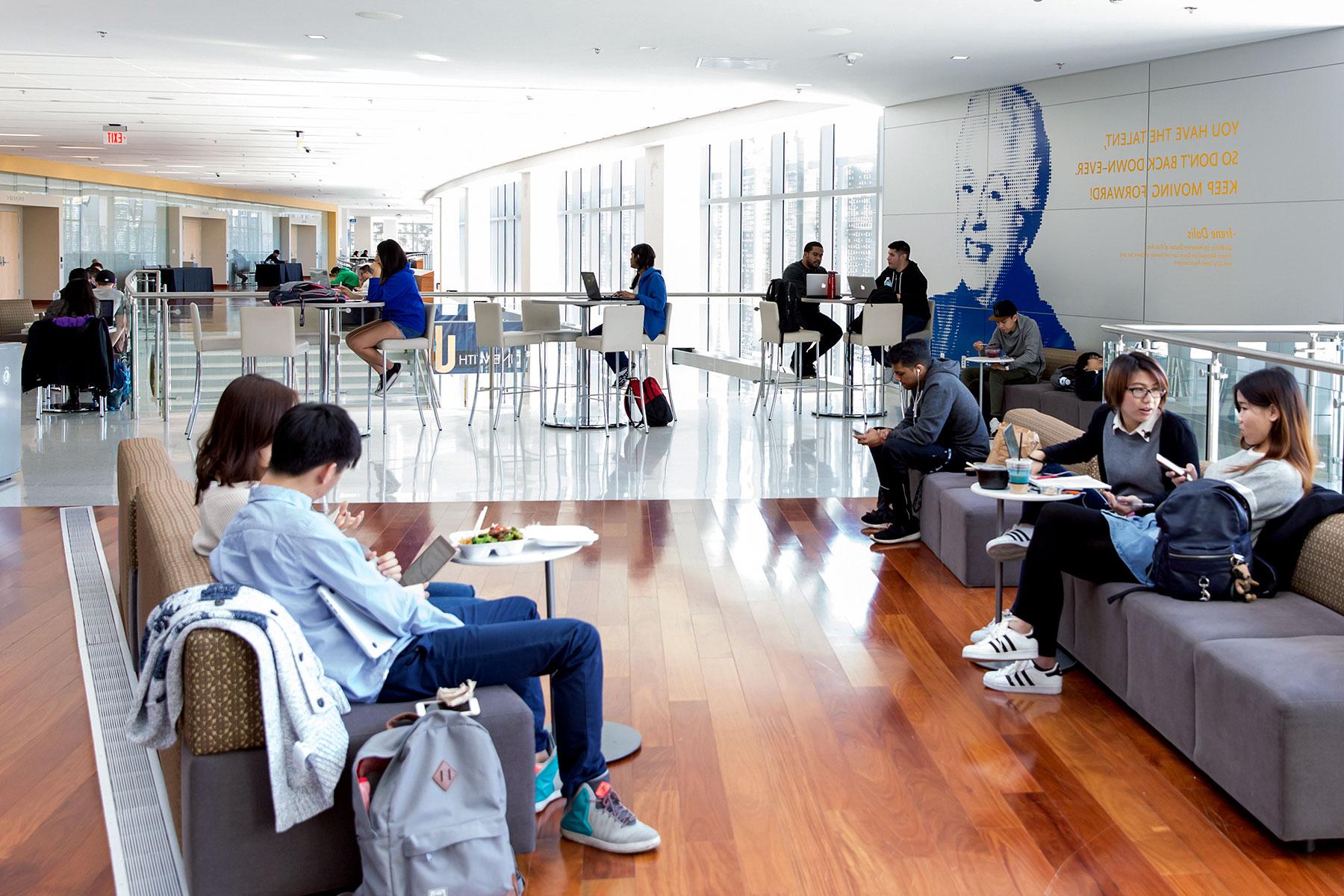 Students and employees enjoying the lounge area in the student union.