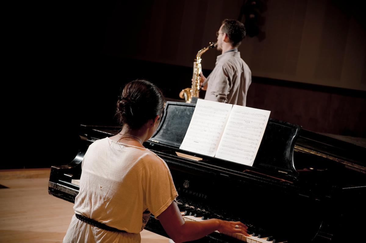 a student playing the piano